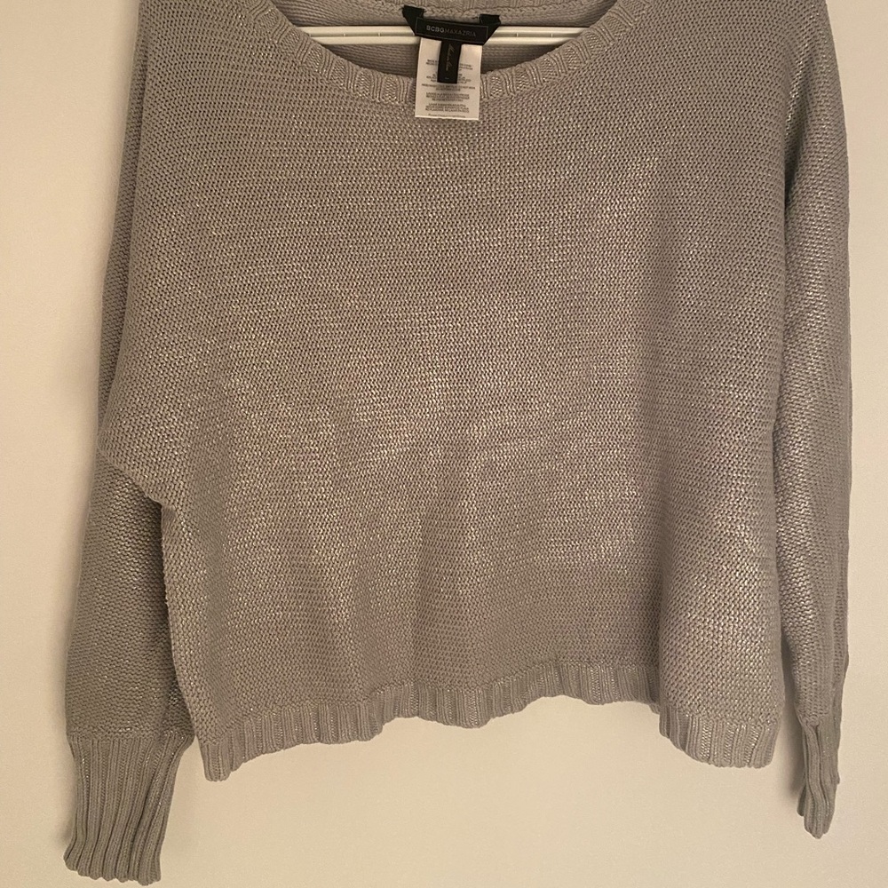 Pre-owned BCBG Silver Sweater. Good condition. See photos for details.